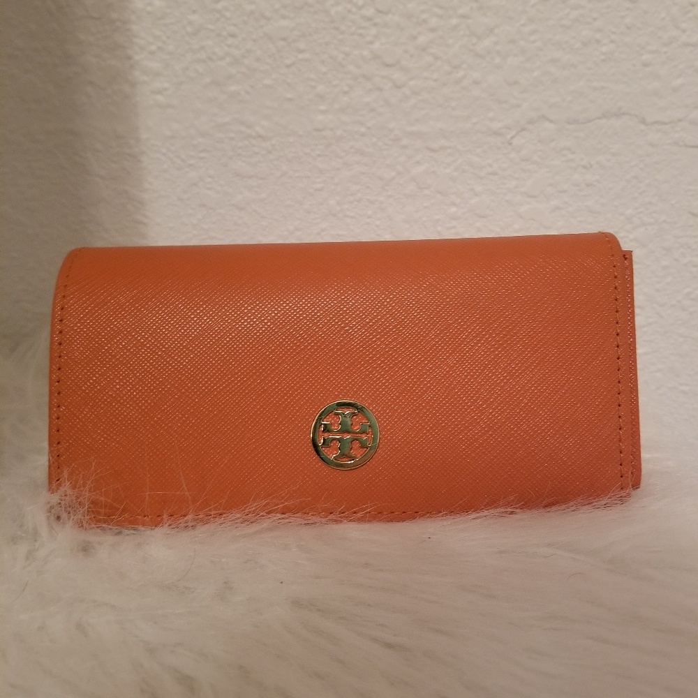 Tory Burch Sunglasses.